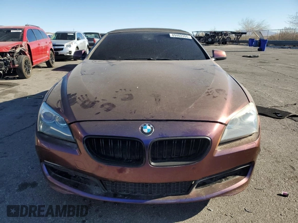 2012 BMW 6 Series 650i z VIN WBALZ3C50CC397706, wystawiony jako Copart lot #89402265 z przebiegiem 92 186 mil mil oraz Szkoda całkowita • Salvage title. Historia ofert i sprzedaży dostępna na DreamBid. Obrazek 5.