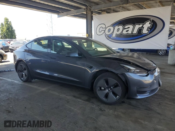 2023 Tesla Model 3 with VIN 5YJ3E1EA4PF456228, listed as a Copart auction lot 61442085 with 121,173 mi miles and Clean title. Bid and sale history available at DreamBid. Image 4.