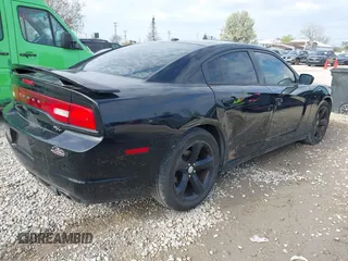 2013 Dodge Charger RT with VIN 2C3CDXCTXDH541059, listed as a IAAI auction lot 42135390 with 154,250 mi miles. Bid and sale history available at carsss.com. Image 4.