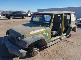 2008 Jeep Wrangler Unlimited Sahara with VIN 1J4GA59138L586072, listed as a IAAI auction lot 41177567 with 1 mi miles. Bid and sale history available at carsss.com. Image 17.
