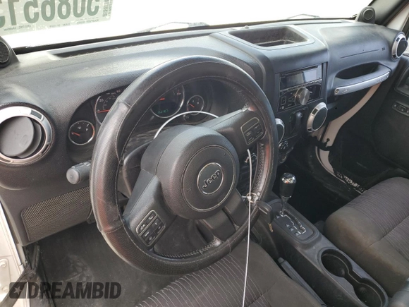2012 Jeep Wrangler Arctic with VIN 1C4AJWBG1CL154184, listed as a Copart auction lot 50865135 with 152,767 mi miles and Clean title. Bid and sale history available at DreamBid. Image 8.