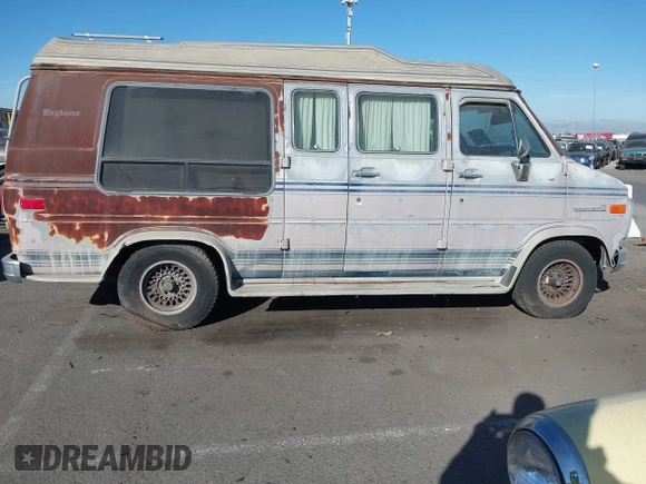 1989 GMC Vandura z VIN 1GDEG25K1K7521984, wystawiony jako IAAI lot #41371811 z przebiegiem 43 502 mil mil oraz . Historia ofert i sprzedaży dostępna na DreamBid. Obrazek 12.