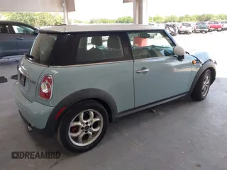 2012 MINI Hardtop with VIN WMWSU3C55CT261047, listed as a IAAI auction lot 42160995 with 123,879 mi miles and . Bid and sale history available at DreamBid. Image 4.