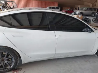 2021 Tesla Model 3 Long Range with VIN 5YJ3E1EB1MF852881, listed as a IAAI auction lot 41643234 with 92,346 mi miles. Bid and sale history available at carsss.com. Image 13.