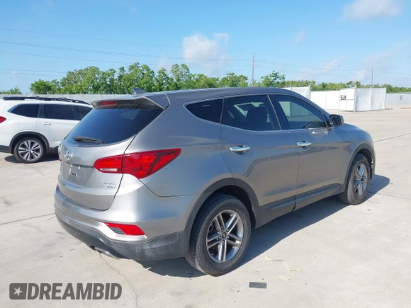 2017 Hyundai Santa Fe 2.4L z VIN 5XYZTDLB7HG444033, wystawiony jako IAAI lot #42263907 z przebiegiem 107 454 mil mil oraz . Historia ofert i sprzedaży dostępna na DreamBid. Obrazek 4.