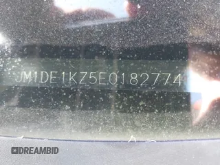 2014 Mazda 2 Sport z VIN JM1DE1KZ5E0182774, wystawiony jako IAAI lot #41657662 z przebiegiem 156 821 mil mil oraz . Historia ofert i sprzedaży dostępna na DreamBid. Obrazek 9.