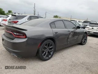 2019 Dodge Charger SXT with VIN 2C3CDXBG2KH670415, listed as a Copart auction lot 51668255 with 60,776 mi miles and Clean Title. Bid and sale history available at carsss.com. Image 3.