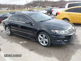 2014 Volkswagen CC R-Line with VIN WVWBN7ANXEE521055, listed as a IAAI auction lot 41197539 with 94,902 mi miles. Bid and sale history available at carsss.com. Image 1.