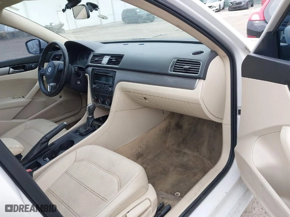 2014 Volkswagen Passat Wolfsburg Ed with VIN 1VWAT7A38EC087906, listed as a IAAI auction lot 41623631 with 124,079 mi miles. Bid and sale history available at carsss.com. Image 5.