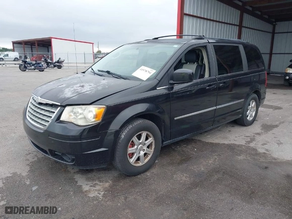 2010 Chrysler Town & Country Touring Plus with VIN 2A4RR8DX1AR496222, listed as a IAAI auction lot 41978794 with 145,715 mi miles. Bid and sale history available at carsss.com. Image 2.