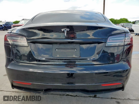 2022 Tesla Model S с VIN 5YJSA1E50NF492117, выставлен на аукционе Copart как лот 54307855 с пробегом 42 940 миль миль и Списание • Salvage title. История ставок и продаж доступна на DreamBid. Изображение 6.