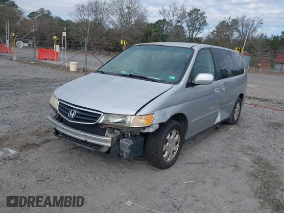 2004 Honda Odyssey EX with VIN 5FNRL18694B118357, listed as a IAAI auction lot 41508682 with 169,017 mi miles and . Bid and sale history available at DreamBid. Image 2.