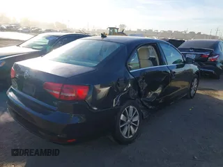 2015 Volkswagen Jetta Sedan 1.8T SE with VIN 3VWD17AJ3FM407697, listed as a IAAI auction lot 40659086 with 107,834 mi miles. Bid and sale history available at carsss.com. Image 4.