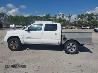 2014 Toyota Tacoma PreRunner with VIN 3TMJU4GN2EM169071, listed as a IAAI auction lot 41543601 with 304,594 mi miles. Bid and sale history available at carsss.com. Image 14.