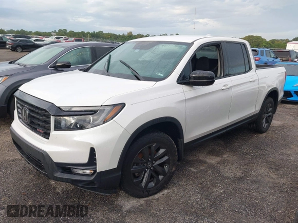 2023 Honda Ridgeline Sport z VIN 5FPYK3F14PB049364, wystawiony jako IAAI lot #40474507 z przebiegiem Nie podano mil oraz . Historia ofert i sprzedaży dostępna na DreamBid. Obrazek 17.