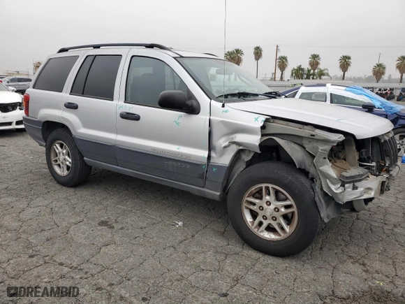 2004 Jeep Grand Cherokee Laredo with VIN 1J4GX48S64C151124, listed as a Copart auction lot 52669445 with 152,970 mi miles and Salvage Title. Bid and sale history available at carsss.com. Image 4.