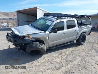 2013 Toyota Tacoma with VIN 5TFLU4EN2DX049615, listed as a IAAI auction lot 41893876 with 160,752 mi miles and . Bid and sale history available at DreamBid. Image 2.