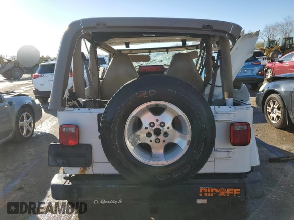 2002 Jeep Wrangler Sahara with VIN 1J4FA59S42P707938, listed as a Copart auction lot 81139774 with 168,338 mi miles and Salvage Title. Bid and sale history available at carsss.com. Image 6.