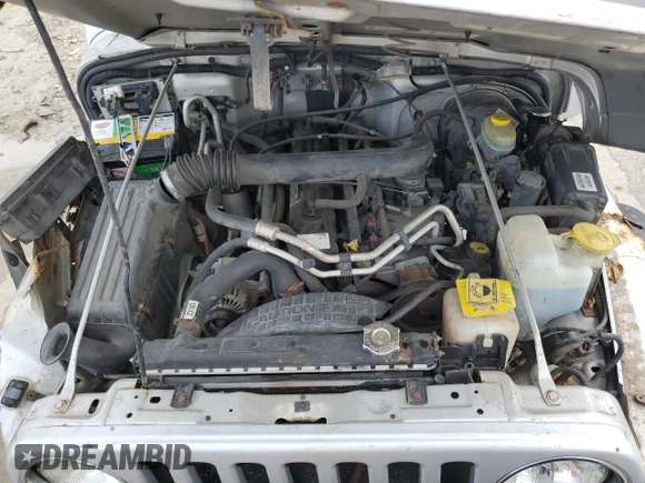 2002 Jeep Wrangler Sport with VIN 1J4FA49S32P733909, listed as a Copart auction lot 72776204 with 157,508 mi miles and Non Repairable. Bid and sale history available at carsss.com. Image 11.