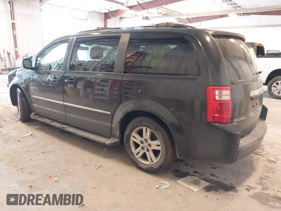2010 Dodge Grand Caravan Crew with VIN 2D4RN6DX1AR438135, listed as a IAAI auction lot 41734378 with 57,041 mi miles and . Bid and sale history available at DreamBid. Image 3.