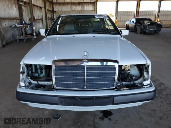 1991 Mercedes-Benz 300 CE с VIN WDBEA51D3MB285660, выставлен на аукционе Copart как лот 49656285 с пробегом 93 772 миль миль и Списание • Salvage title. История ставок и продаж доступна на DreamBid. Изображение 5.
