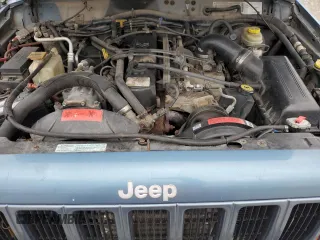 1999 Jeep Cherokee Sport with VIN 1J4FF68S4XL567848, listed as a Copart auction lot 43222045 with 280,178 mi miles and Salvage title. Bid and sale history available at DreamBid. Image 11.