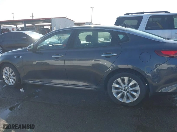 2018 Kia Optima LX with VIN 5XXGT4L33JG247502, listed as a IAAI auction lot 41476255 with NaN miles. Bid and sale history available at carsss.com. Image 14.