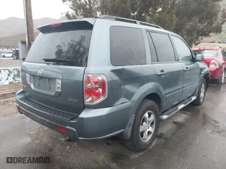 2006 Honda Pilot EX-L with VIN 2HKYF18506H503658, listed as a IAAI auction lot 41744963 with 215,575 mi miles. Bid and sale history available at carsss.com. Image 4.