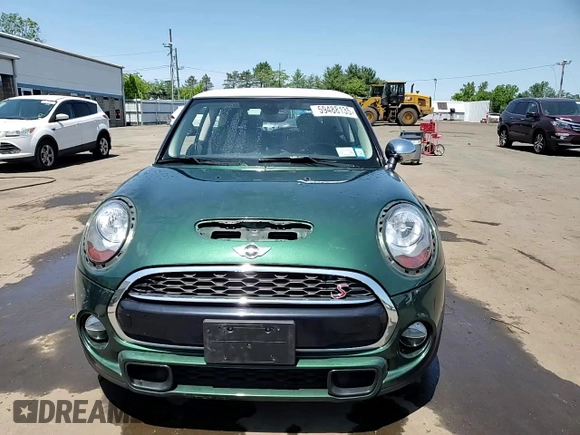 2017 MINI Hardtop Cooper S z VIN WMWXP7C57H3B93817, wystawiony jako Copart lot #59488135 z przebiegiem 68 596 mil mil oraz Szkoda całkowita • Salvage title. Historia ofert i sprzedaży dostępna na DreamBid. Obrazek 14.