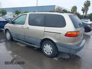 2000 Toyota Sienna LE with VIN 4T3ZF13C5YU315823, listed as a IAAI auction lot 42232438 with 248,010 mi miles and . Bid and sale history available at DreamBid. Image 3.
