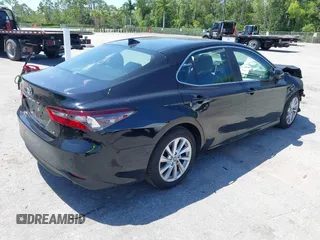 2023 Toyota Camry LE z VIN 4T1C11AK2PU120803, wystawiony jako IAAI lot #42060384 z przebiegiem 38 897 mil mil oraz . Historia ofert i sprzedaży dostępna na DreamBid. Obrazek 4.