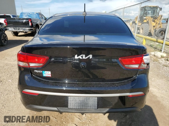 2022 Kia Rio S with VIN 3KPA24AD5NE463208, listed as a Copart auction lot 68380014 with 37,572 mi miles and Salvage Title. Bid and sale history available at DreamBid. Image 6.