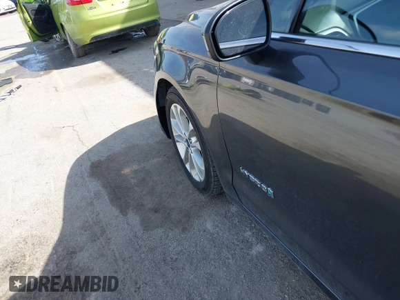 2019 Ford Fusion Hybrid SE with VIN 3FA6P0LU6KR163927, listed as a IAAI auction lot 41834612 with 104,342 mi miles. Bid and sale history available at carsss.com. Image 12.