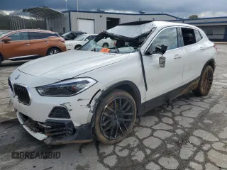 2022 BMW X2 sDrive28i with VIN WBXYH9C0XN5U53700, listed as a Copart auction lot 80884664 with 0 mi miles and Salvage Title. Bid and sale history available at carsss.com. Image 1.