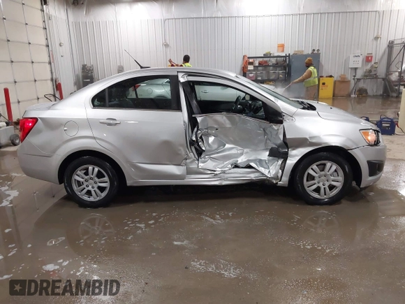 2014 Chevrolet Sonic LT with VIN 1G1JC5SG8E4107664, listed as a IAAI auction lot 41614306 with 128,946 mi miles and . Bid and sale history available at DreamBid. Image 13.