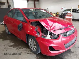 2014 Hyundai Accent GLS z VIN KMHCT4AE8EU706974, wystawiony jako IAAI lot #42444602 z przebiegiem 157 089 mil mil oraz . Historia ofert i sprzedaży dostępna na DreamBid. Obrazek 1.