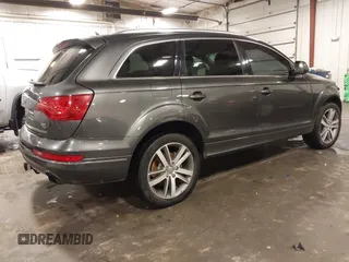 2015 Audi Q7 Premium Plus z VIN WA1LGAFE1FD023297, wystawiony jako IAAI lot #42128488 z przebiegiem 173 407 mil mil oraz . Historia ofert i sprzedaży dostępna na DreamBid. Obrazek 4.