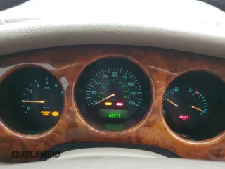 1999 Jaguar XJ with VIN SAJKD6041XC876928, listed as a Copart auction lot 60038405 with 63,917 mi miles and Clean title. Bid and sale history available at DreamBid. Image 9.