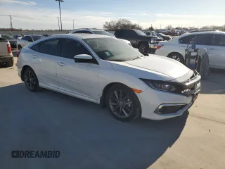 2021 Honda Civic Sedan EX with VIN 2HGFC1F36MH703582, listed as a Copart auction lot 47260765 with 33,673 mi miles and Salvage Title. Bid and sale history available at carsss.com. Image 4.
