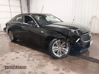 2021 Cadillac CT4 Premium Luxury z VIN 1G6DF5RK6M0133758, wystawiony jako IAAI lot #40832245 z przebiegiem 13 543 mil mil oraz . Historia ofert i sprzedaży dostępna na DreamBid. Obrazek 1.