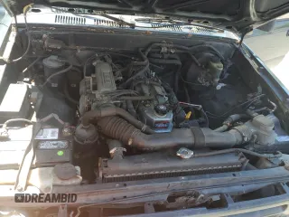 1994 Toyota Pickup z VIN 4TARN81A8RZ287705, wystawiony jako Copart lot #58603125 z przebiegiem 146 940 mil mil oraz Tytuł czysty. Historia ofert i sprzedaży dostępna na DreamBid. Obrazek 11.