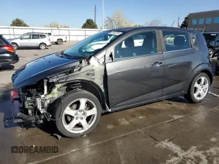 2016 Chevrolet Sonic LTZ z VIN 1G1JE6SB0G4157949, wystawiony jako Copart lot #52582395 z przebiegiem 76 516 mil mil oraz Szkoda całkowita • Salvage title. Historia ofert i sprzedaży dostępna na DreamBid. Obrazek 1.