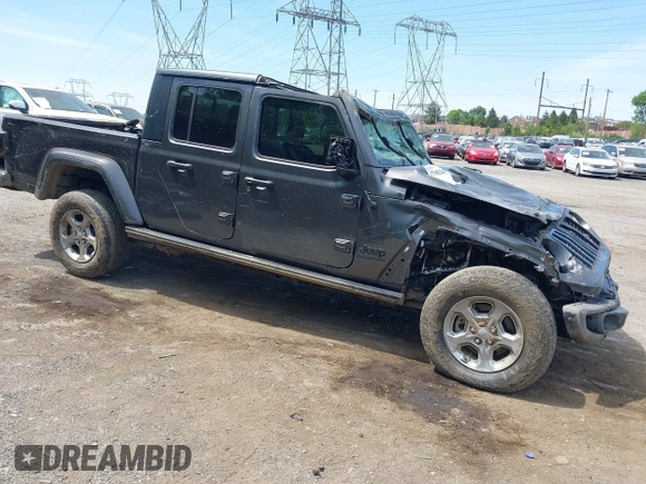 2021 Jeep Gladiator Freedom with VIN 1C6HJTAG3ML557932, listed as a IAAI auction lot 42150245 with 26,656 mi miles and . Bid and sale history available at DreamBid. Image 1.