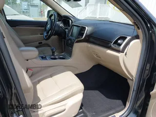 2014 Jeep Grand Cherokee Limited with VIN 1C4RJFBG3EC497939, listed as a IAAI auction lot 42127152 with 112,095 mi miles and . Bid and sale history available at DreamBid. Image 5.