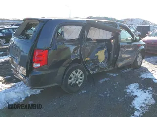 2016 Dodge Grand Caravan SE with VIN 2C4RDGBG1GR211030, listed as a IAAI auction lot 41386099 with 73,244 mi miles and . Bid and sale history available at DreamBid. Image 4.