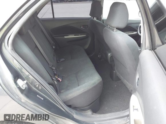 2009 Toyota Yaris with VIN JTDBT903994050383, listed as a IAAI auction lot 42134282 with 122,824 mi miles and . Bid and sale history available at DreamBid. Image 8.
