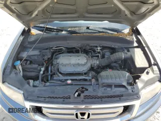 2009 Honda Ridgeline RTL z VIN 5FPYK16549B100193, wystawiony jako Copart lot #54103105 z przebiegiem 186 580 mil mil oraz Szkoda całkowita • Salvage title. Historia ofert i sprzedaży dostępna na DreamBid. Obrazek 11.