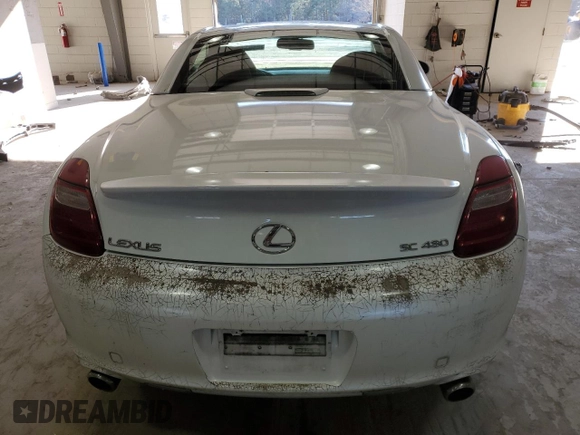 2007 Lexus SC 430 with VIN JTHFN45Y879012287, listed as a Copart auction lot 84038734 with 80,308 mi miles and Salvage Title. Bid and sale history available at DreamBid. Image 6.