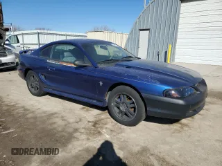 1997 Ford Mustang with VIN 1FALP404XVF156625, listed as a Copart auction lot 43497705 with 194,551 mi miles and Salvage Title. Bid and sale history available at carsss.com. Image 4.