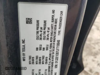 2020 Tesla Model 3 Long Range z VIN 5YJ3E1EB7LF710646, wystawiony jako Copart lot #57403355 z przebiegiem 98 080 mil mil oraz Szkoda całkowita • Salvage title. Historia ofert i sprzedaży dostępna na DreamBid. Obrazek 13.